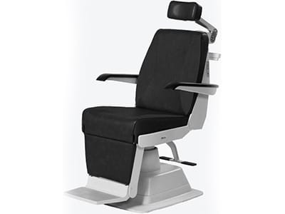 Black medical examination chair with adjustable headrest.
