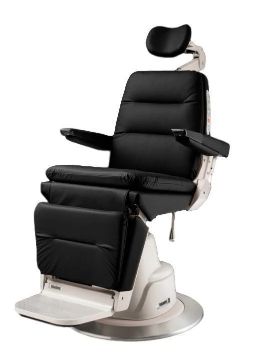 Black reclining medical examination chair isolated. Black reclining medical examination chair isolated.