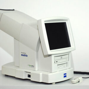 A Zeiss FDT Matrix 715 computer is sitting on top of a white table.