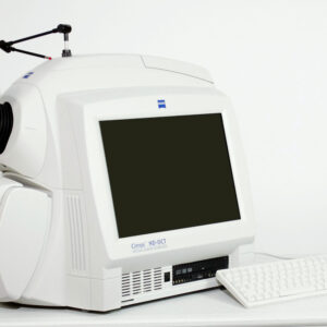 A Zeiss OCT Cirrus 4000 with a mouse and keyboard sitting on top of it.