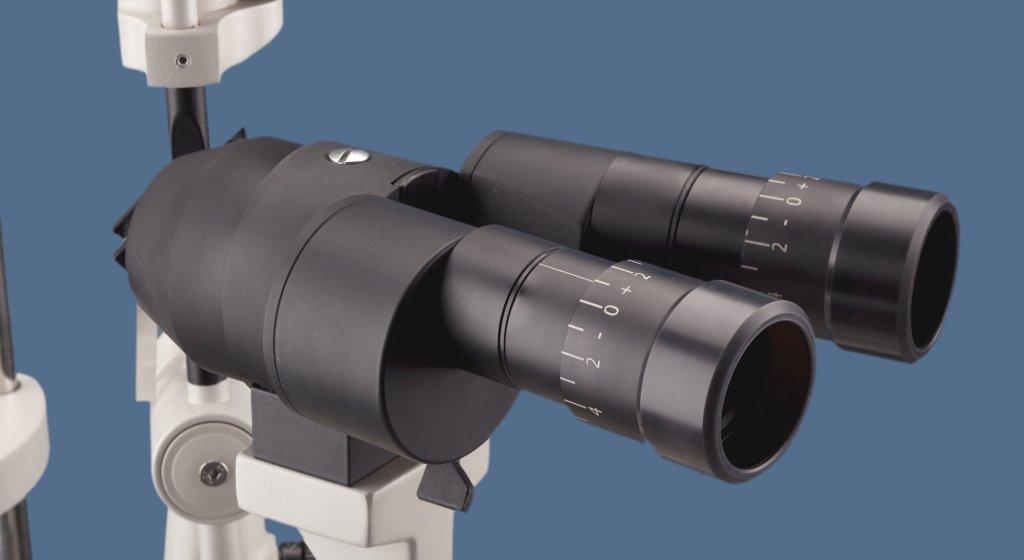 Optical microscope with adjustable eyepieces close-up.