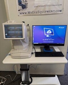 Eye examination equipment with computer setup.