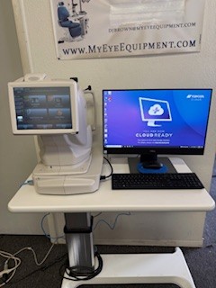 Eye examination equipment with computer setup.